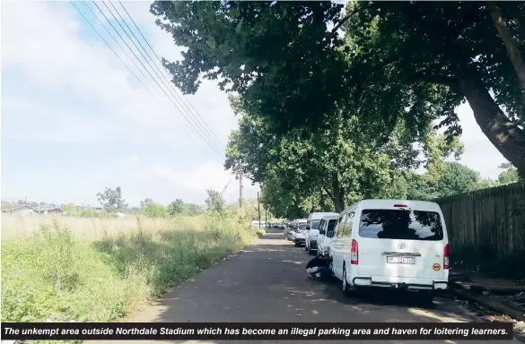  ?? ?? The unkempt area outside Northdale Stadium which has become an illegal parking area and haven for loitering learners.