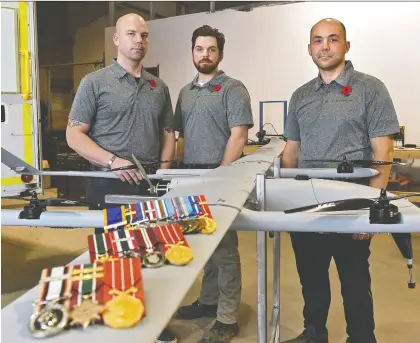  ?? ED KAISER ?? Canadian Forces veterans, from left, Cole Rosentrete­r, Joshua Richard and John Hryniw have transition­ed into civilian life by founding Pegasus Imagery, a company that uses drones to provide informatio­n to emergency services personnel during emergency situations like wildfires.