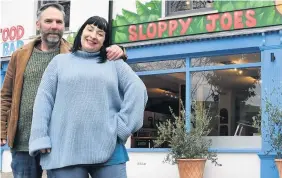  ?? GAYLE MARSH ?? Gary and Kristin Ridley outside their restaurant in Carmarthen