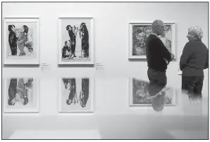  ?? AP/PETER KLAUNZER ?? Visitors talk in front of Junges Paar (left) and Diskussion by Emil Nolde in an exhibit of what Nazis called “degenerate art” at the Kunstmuseu­m in Bern.