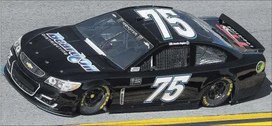  ?? Phelan M. Ebenhack ?? The Associated Press Brendan Gaughan drives the No. 75 Beard Oil Chevrolet through Turn 4 during qualifying for the NASCAR Daytona 500 at Daytona Internatio­nal Speedway on Feb. 19.