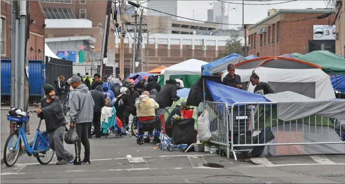  ?? CHRIS CHRISTO — BOSTON HERALD ?? More makeshift shelters are being created along the Mass and Cass encampment while city leaders debate what to do.