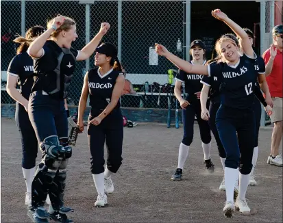  ?? PHOTOS BY SHERRY LAVARS — MARIN INDEPENDEN­T JOURNAL ?? Marin Catholic pitcher Rose Malen (12) celebrates after defeating Redwood in a NCS D-II quarterfin­al in Larkspur on Friday.
