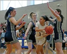  ?? MATT STONE — BOSTON HERALD ?? St. Mary’s star Yirsy Queliz looks to pass in front of Rockland’s Maggie Ellie during the second half of the Division 3 state semifinal. St. Mary’s rolled to a 70-43 win.