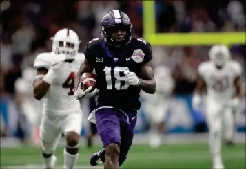  ?? ASSOCIATED PRESS ?? TCU WIDE RECEIVER JALEN REAGOR (18) SCORES ON A 93-YARD TOUCHDOWN reception against Stanford during the second half of the Alamo Bowl on Thursday, in San Antonio.