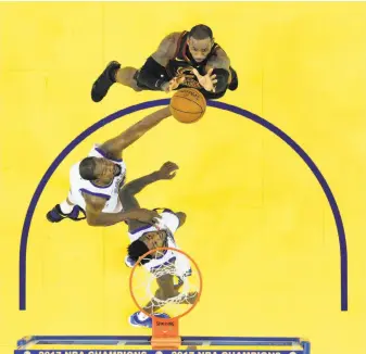  ?? Carlos Avila Gonzalez / The Chronicle 2017 ?? LeBron James shoots over Kevin Durant (left) and Jordan Bell during the Warriors’ Christmas Day win over the Cavaliers. James will be playing in his eighth consecutiv­e NBA Finals.