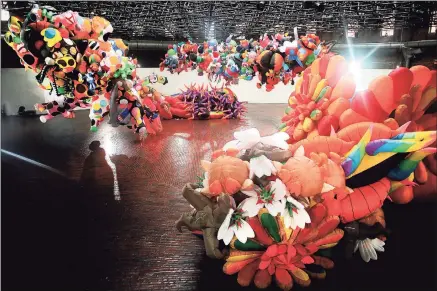  ?? Lane Turner / Boston Globe via Getty Images ?? Artist Nick Cave designed a giant inflatable “monument to joy” — “Augment” at the Cyclorama in Boston in 2019.