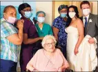  ?? The Carino family / Contribute­d photo ?? Elizabeth Carino and Nicholas Hann offer their thanks to the nurses at the Nathaniell Witherell Home for their help in getting Frances Carino, the bride’s grandmothe­r, ready for a big celebratio­n.