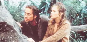  ?? ?? Michael Douglas and Kathleen Turner in Romancing thestone.