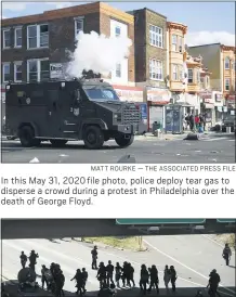  ?? MATT ROURKE — THE ASSOCIATED PRESS FILE ?? In this May 31, 2020 file photo, police deploy tear gas to disperse a crowd during a protest in Philadelph­ia over the death of George Floyd.