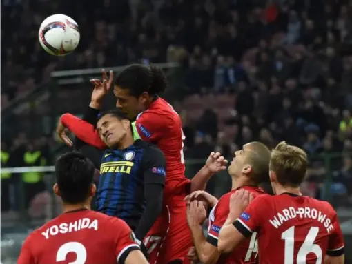  ??  ?? Virgil van Dijk heads an Inter corner away to safety (Getty)