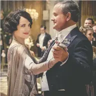  ?? FOCUS FEATURES ?? Elizabeth McGovern and Hugh Bonneville in the 2019 Downton Abbey film. Bonneville says
the cast “would love to do” a followup.