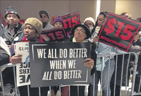  ?? Paul Grondahl / Times Union ?? Hundreds of demonstrat­ors bused up from New York City in 2016 joined the Fight for $15 protest to raise the minimum wage at Empire State Plaza.