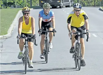  ?? MIKE DIBATTISTA/POSTMEDIA NETWORK ?? Peterborou­gh resident Don Bourne cycled 100 kilometres through Niagara on Thursday to marked his 80th birthday. Riding alongside him were his wife Becky Bourne and his grandson Andrew Yorke, a triathlete who represente­d Canada at the Rio Olympics.