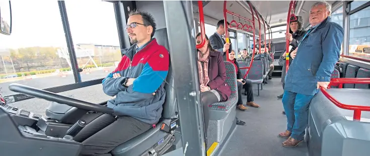  ?? Picture: James Chapelard Photograph­y. ?? Europe’s first full size self-driving bus took passengers around the SEC car park in Glasgow as part of CAV Scotland.
