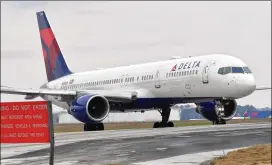  ?? HYOSUB SHIN/AJC FILE ?? Delta Air Lines has been the last holdout among major carriers in blocking access to middle seats on flights. The airline will end that practice as of May 1, with CEO Ed Bastian saying, “We’re ready to help customers reclaim their lives.”