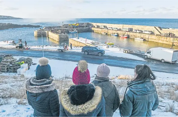  ??  ?? ON SET: Filming scenes for the latest series of BBC show Peaky Blinders at Portsoy harbour earlier this month. Picture by Jason Hedges.