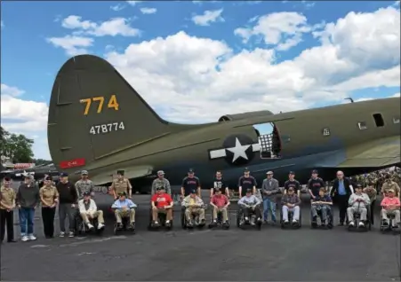  ?? PHOTO COURTESY OF DANIEL BOONE SCHOOL DISTRICT ?? As a part of the 2nd Wheelchair Brigade at the World War II Air Show on June 2, Daniel Boone High School JROTC cadets were joined by the cadets from Owen J. Roberts to escort veterans from the Coatesvill­e VA, Keystone Villa, and Country Meadows.