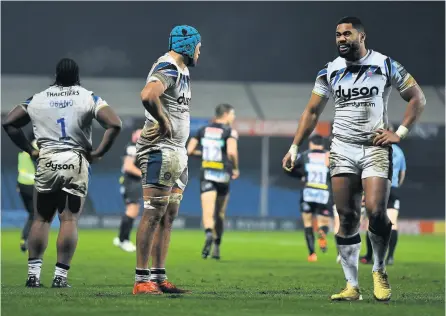  ?? PICTURE: Harry Trump/getty Images ?? Joe Cokanasiga (right), Zach Mercer (centre) and Beno Obano (left) react as Sam Hidalgo-clyne goes over to score Exeter’s fifth try against Bath