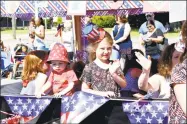  ?? Lara Green-Kazlauskas / For Hearst Connecticu­t Media ?? Children on floats were part of Torrington’s annual Memorial Day parade in 2019.