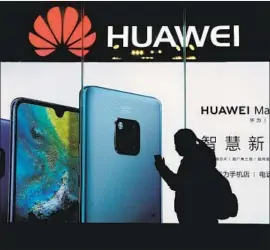  ?? Andy Wong Associated Press ?? ALTHOUGH a ban on Huawei equipment sales in the U.S. would be largely symbolic, it would further inflame trade tensions between Beijing and Washington.