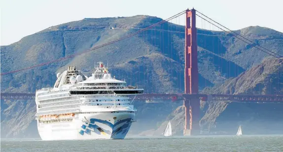  ?? Photos / AP ?? There are reports that three Kiwis were among the crew on the Grand Princess, where 21 people tested positive for coronaviru­s.