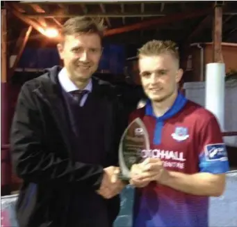  ??  ?? Jack Bayly receives the Drogheda Independen­t Man of the Match award from Marcus Cavaroli for the recent match against Cork City.