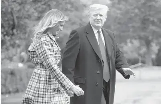  ?? GETTY ?? “If you look at Broward County, they have had a horrible history,” President Donald Trump said before boarding Marine One with First Lady Melania Trump on Friday.