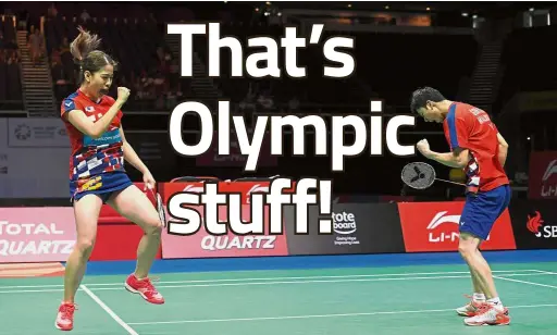  ??  ?? The right mix: Malaysia’s Goh Soon Huat (right) and Shevon Lai Jemie celebratin­g after beating Indonesia’s Tontowi Ahmad and Liliyana Natsir in the mixed doubles final at the Singapore Open yesterday. — AFP