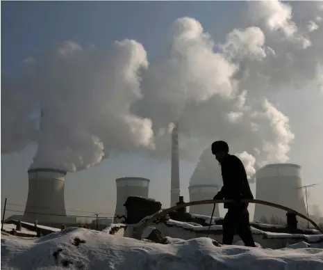  ?? Reuters ?? A coal-fired power plant in Shanxi province. China has made significan­t progress in switching district heating systems to gas