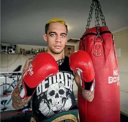  ?? PHOTO: STUFF ?? Hamilton boxer Cairo George won on his return to Singapore with a devastatin­g knockout 59 seconds into the first round.