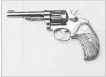  ?? THE CANADIAN PRESS ?? A photograph of a gun released at Dellen Millard's trial for allegedly killing his father, Wayne Millard.