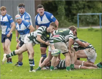  ??  ?? Kanturk’s Sean O’Brien gets the ball away from a ruck in the Munster J-League Division 2 game against Tralee at O’Dowd Park, Tralee