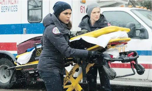  ?? —NBCFILES ?? Monica Raymund, left, and Kara Killmer in Chicago Fire. The drama will air Wednesday nights on NBC along with Chicago Med and Chicago P.D., which allows more opportunit­ies for the shows to ‘overlap and cross over.’