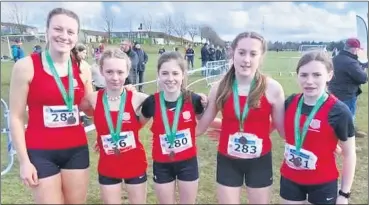  ?? ?? Lucy Lynch (far left) with the St. Al’s, Carrigtwoh­ill team that finished 3rd at the National Schools CrossCount­ry Championsh­ips in Belfast.