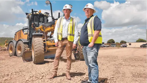  ??  ?? Phoenix Constructi­ons director Nathan Evennett and Kent’s Townsville manager Jason Flynn at the site of a new Stuart facility. Picture: Evan Morgan