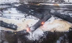  ?? Washington. Photograph: David Ryder/Getty Images ?? A train carrying crude oil burns after being derailed on 22 December 2020 in Custer,