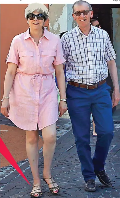  ??  ?? Needing some sunshine: Theresa May with husband Philip on holiday in northern Italy yesterday