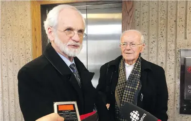  ?? BRETT BUNDALE / THE CANADIAN PRESS ?? Former Knowledge House CEO Daniel Potter, left, speaks to reporters outside a Halifax courtroom on March 9. The technology firm traded on the Toronto Stock Exchange before a 2001 collapse that cost investors millions of dollars.