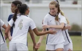  ?? JOHN BLAINE — FOR THE TRENTONIAN ?? Hopewell Valley’s Emily DeNero (8) celebrates after scoring against Nottingham during a quarterfin­al Central Group III game on Friday.