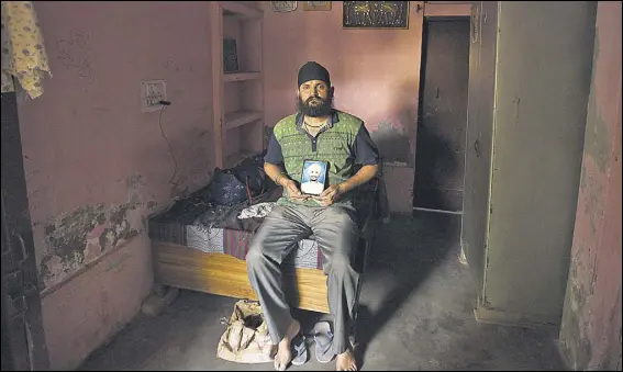  ?? SANCHIT KHANNA/HT PHOTO ?? Rajbir Singh, who lost his father during the riots, at his Tilak Vihar home in New Delhi.