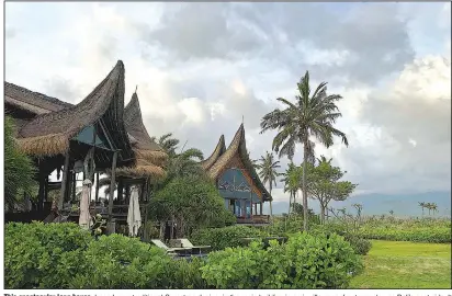  ??  ?? This spectacula­r long house, based on a traditiona­l Sumatran design, is the main building in a six-villa oceanfront complex on Bali’s east side. It was built by American film director Rob Cohen.