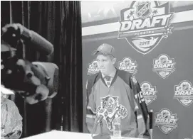  ?? MARK RANDALL/STAFF PHOTOGRAPH­ER ?? Samuel Montembeau­lt faces the media after being drafted by the Florida Panthers in the third round on Saturday at the BB&T Center in Sunrise.