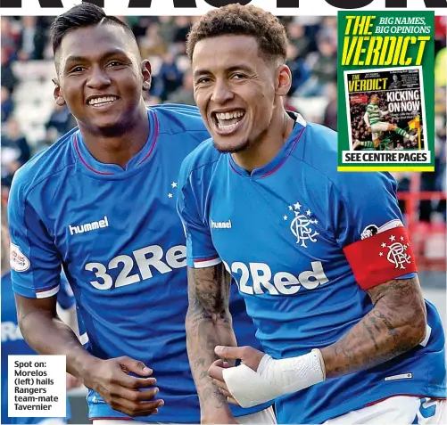  ??  ?? Spot on: Morelos (left) hails Rangers team-mate Tavernier