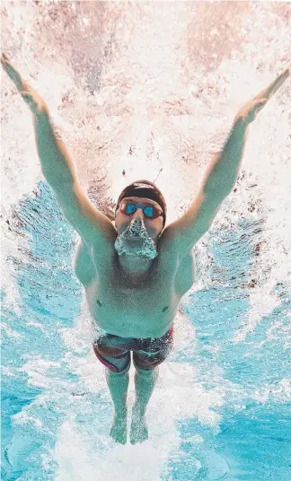  ?? Picture: GETTY IMAGES ?? Bond University club member Elijah Winnington was a star of the Australian age swimming championsh­ips, winning a perfect eight gold medals from eight events. EMMA GREENWOOD