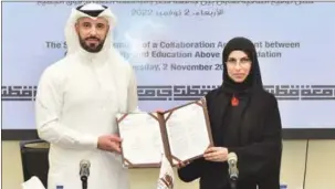  ?? ?? The agreement was signed by QU Vice President for Student Affairs Dr Eiman Mustafawi and EAA Programme Director Talal Al-Hothal.