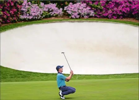  ?? DAVID J. PHILLIP/AP PHOTO ?? Justin Thomas reacts after missing an eagle putt on the 13th green during the second round of the Masters on Friday in Augusta, Ga. Thomas, who can return to No. 1 in the world with a victory this weekend, is three shots off the lead.