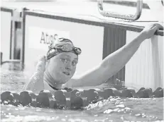  ?? ERICH SCHLEGEL, USA TODAY SPORTS ?? G Ryan, a genderquee­r who does not identify as a man or a woman, competes as a female swimmer for Michigan.