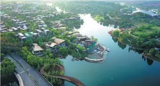  ?? GAO DONG / FOR CHINA DAILY ?? The Luxelakes Eco-City in Chengdu, Sichuan province, is designed in line with the park city concept.
