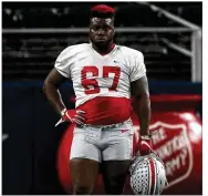  ??  ?? Buckeyes defensive lineman Robert Landers, a Wayne High graduate, was sporting a new hair color at practice Wednesday, matching the red of his jersey numbers.